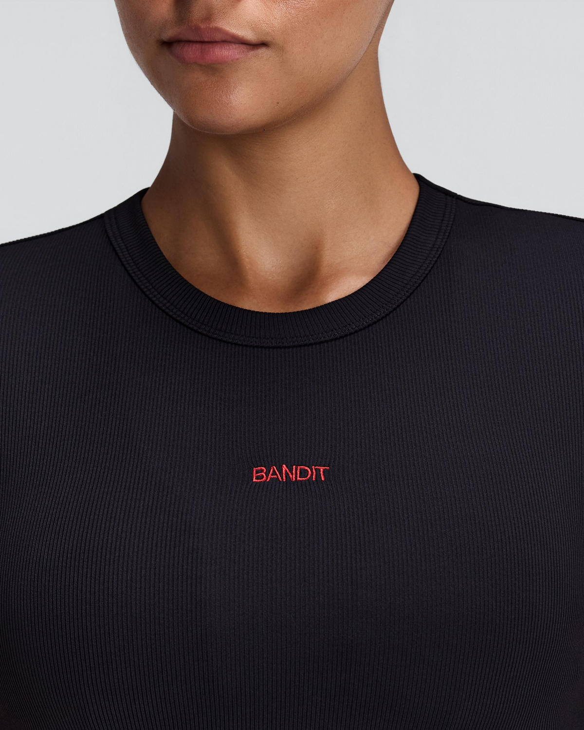 Bandit Women's Vituccia Cropped Performance Tee / Black - Frontrunner Colombo